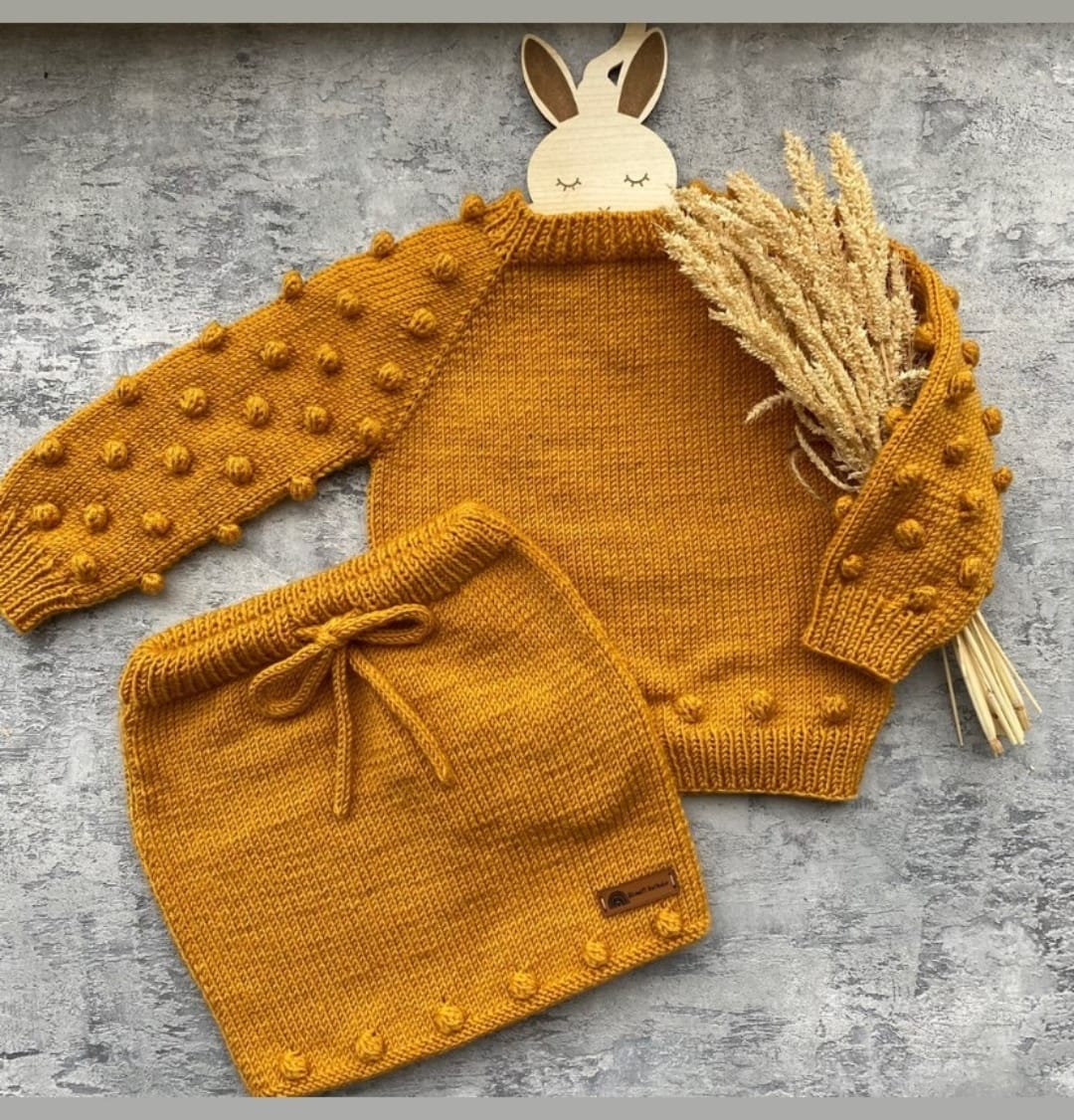 Ponpon tomurcuk desenli bebek örgü modelleri koleksiyonu